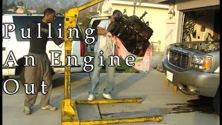 Learn how to remove an engine from a Cadillac Escalade - Pulling my engine out in my driveway